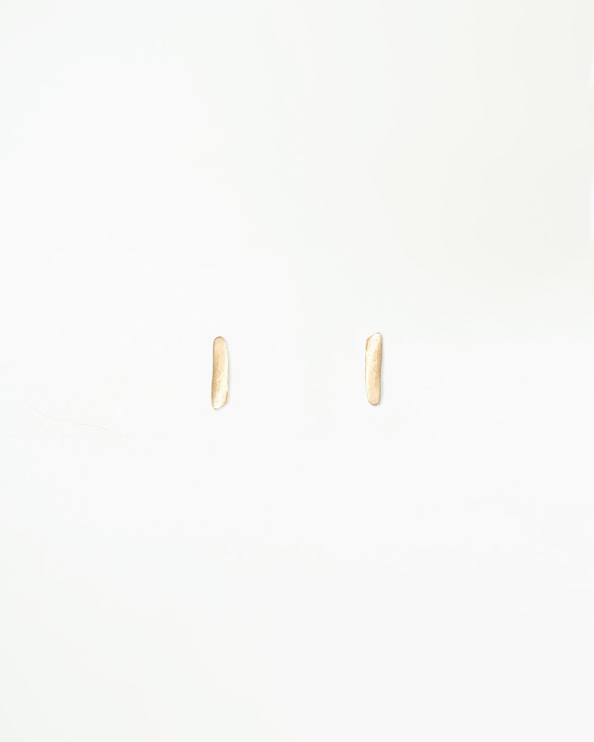 WWAKE Gold Dash Wisp Earrings, tiny 10kt yellow gold bar studs, product view