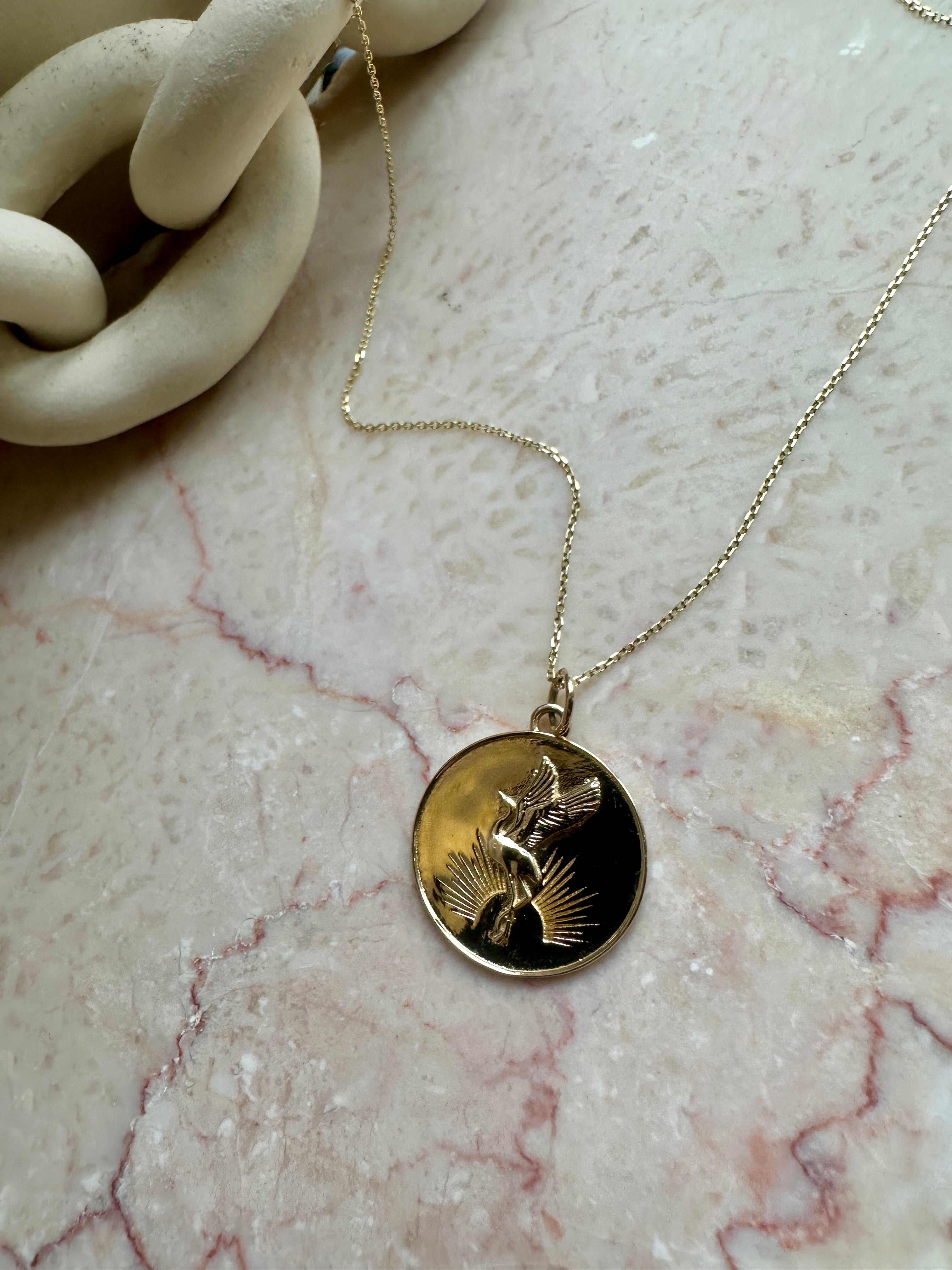 SUNRISE CRANE MEDALLION