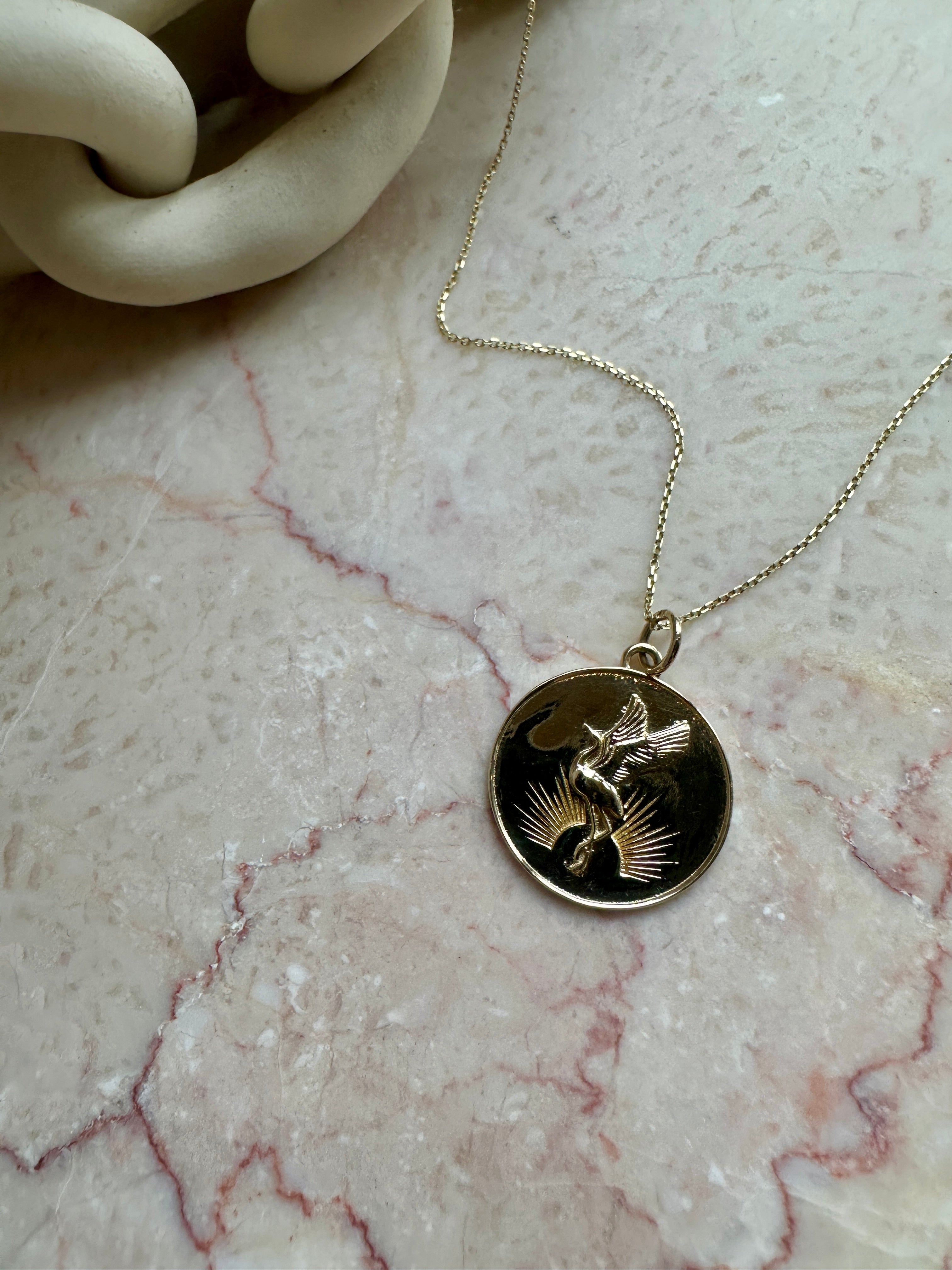 SUNRISE CRANE MEDALLION