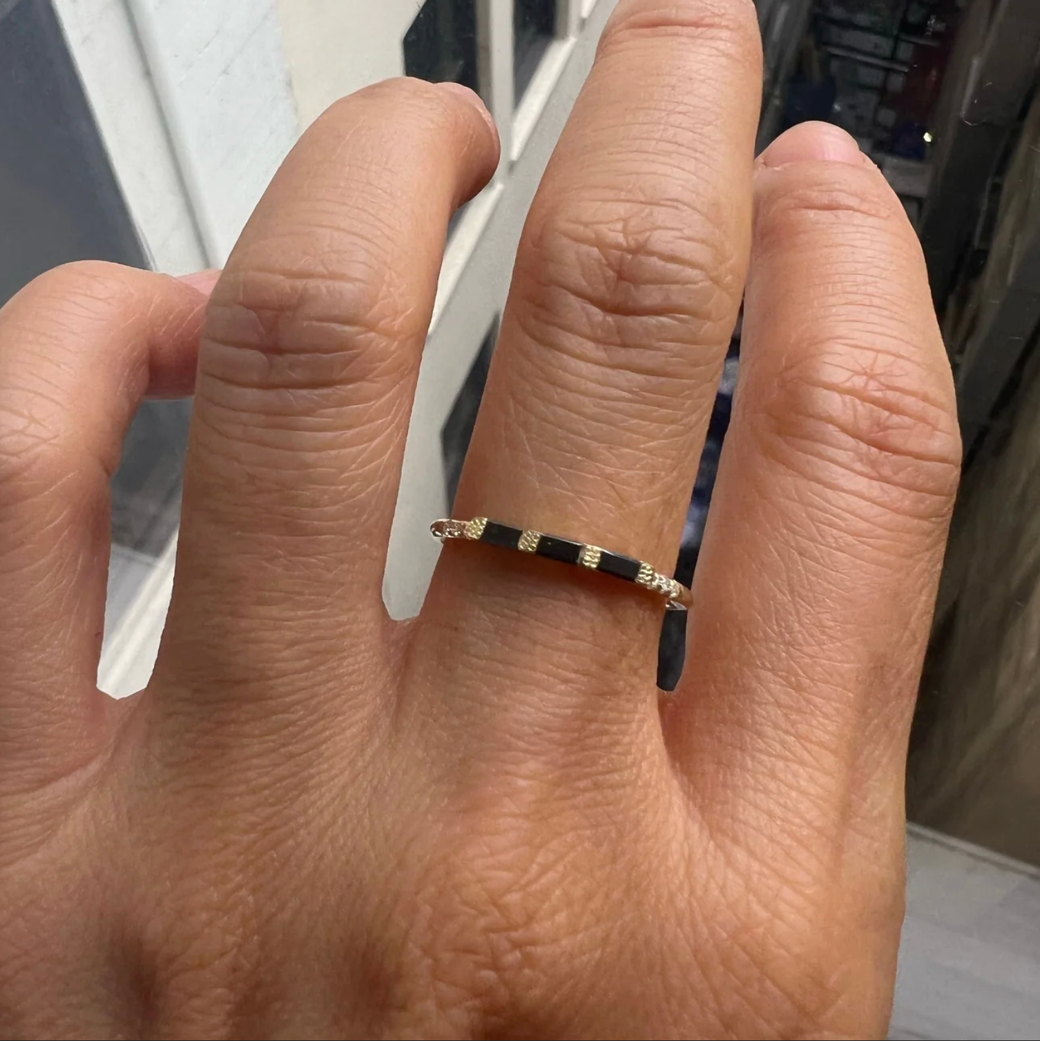 THREE BLACK DIAMOND BAGUETTE BAND