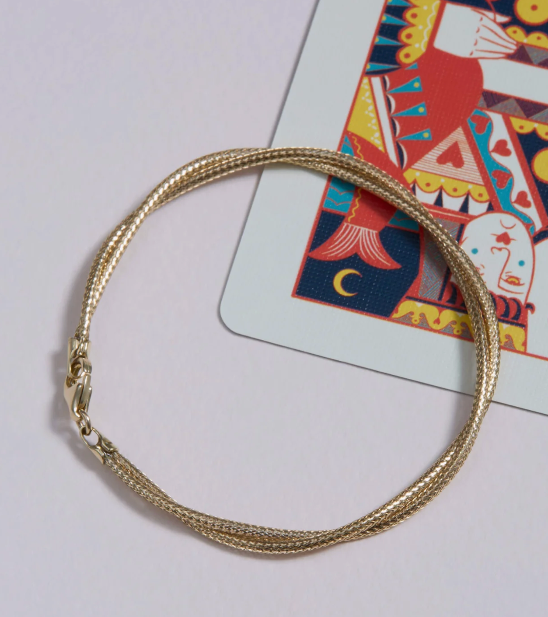 INTERWOVEN GOLD BRACELET