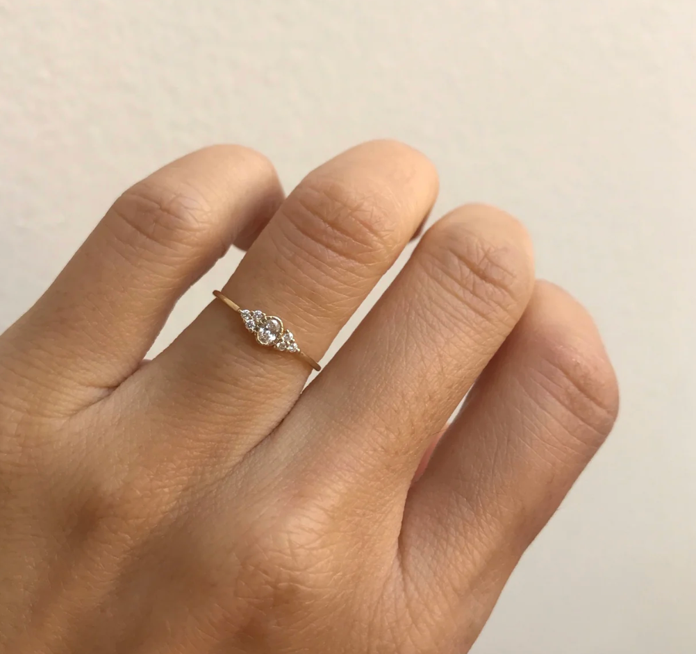 OVAL DIAMOND CLUSTER WHISPER RING