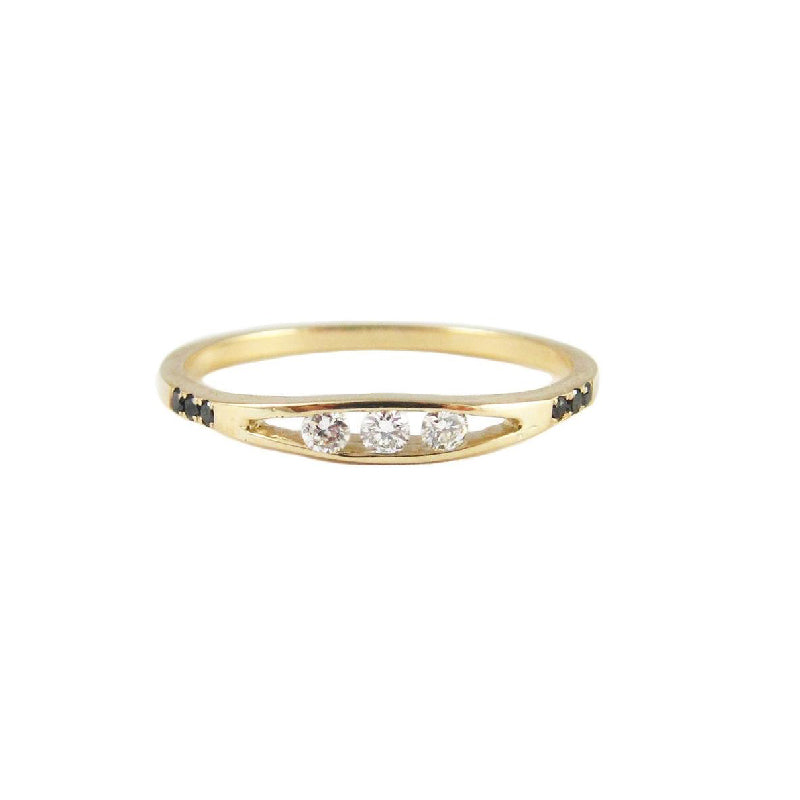 White & Black Diamond Float Ring by Jennie Kwon, three channel set white diamonds with black diamond accents in 14kt yellow gold