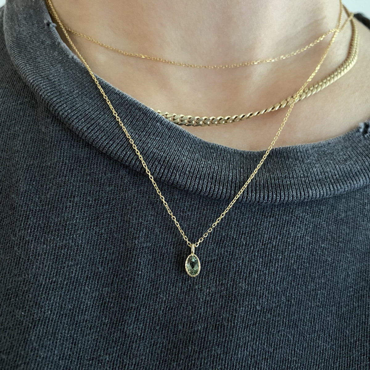 Jennie Kwon Oval Green Sapphire Wisp Necklace styled