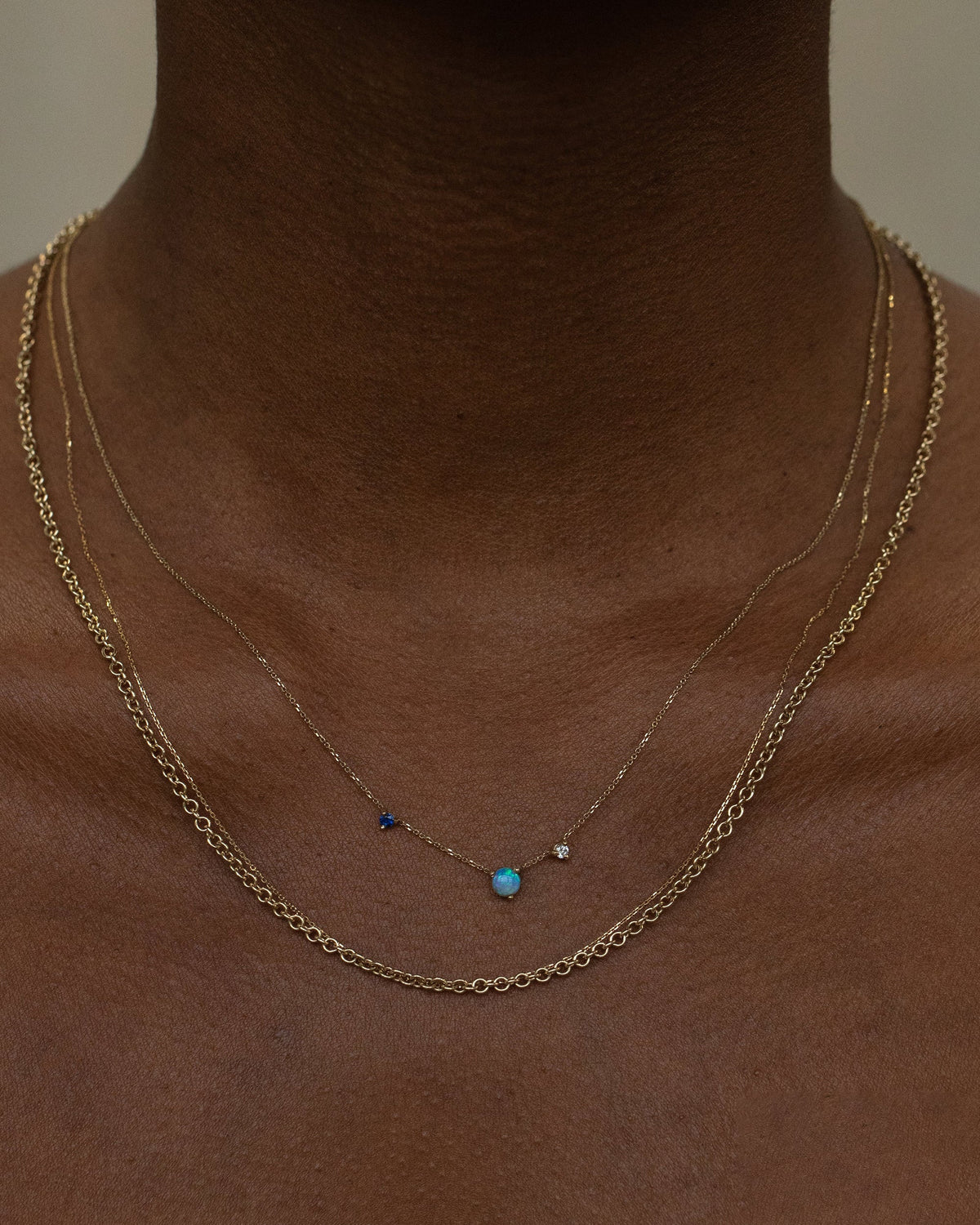 Opal & Diamond Three Step Necklace worn layered