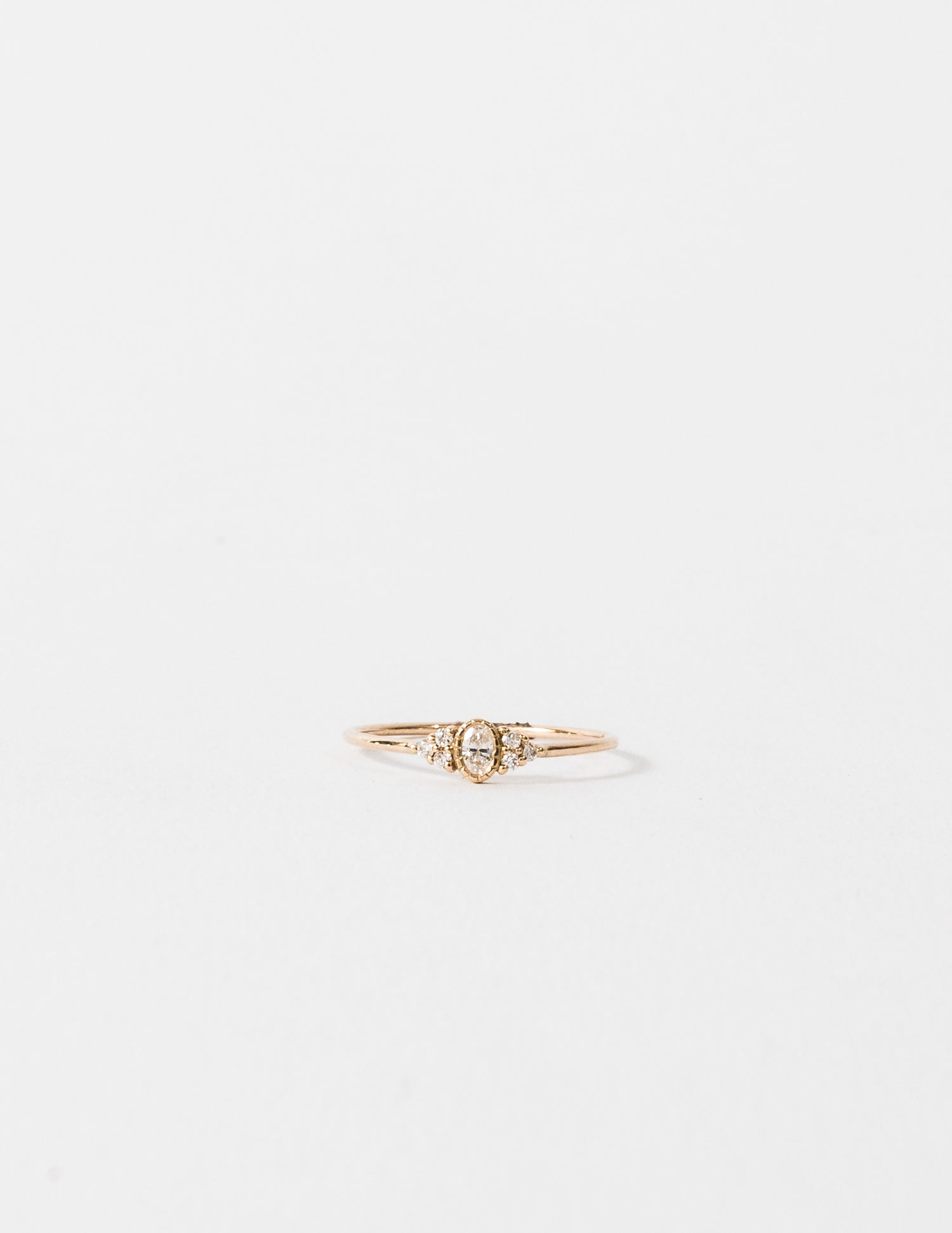 OVAL DIAMOND CLUSTER WHISPER RING