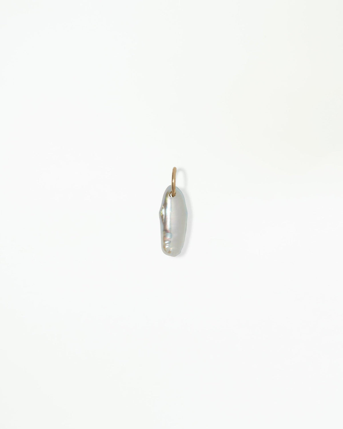 WWAKE Lagniappe Pearl Charm, an elongated pearl on a 14kt yellow gold bail, product view