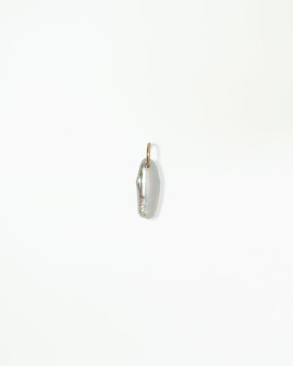 WWAKE Lagniappe Pearl Charm, an elongated pearl on a 14kt yellow gold bail, product view