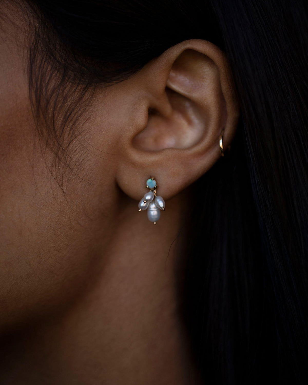Opal &amp; Pearl Cloudburst Earrings worn on the ear
