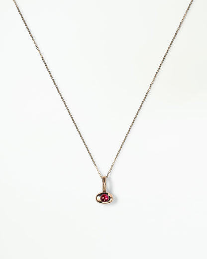 WWAKE January Garnet Tempo Pendant in 14kt yellow gold on a fine chain