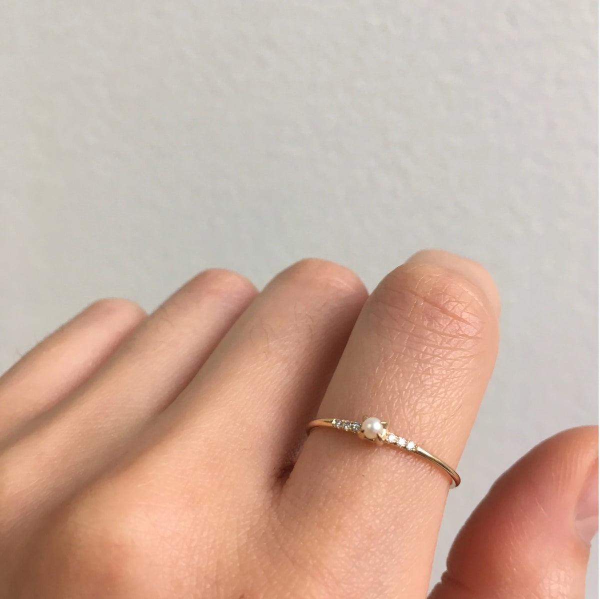 White Diamond Pearl Equilibrium Ring with a pearl and white diamonds in 14kt yellow gold, product view 1