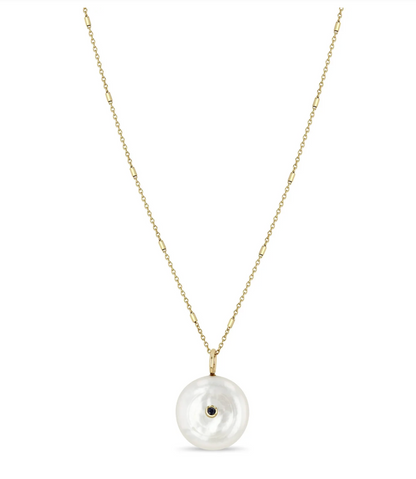 Pearl disc with black diamond side