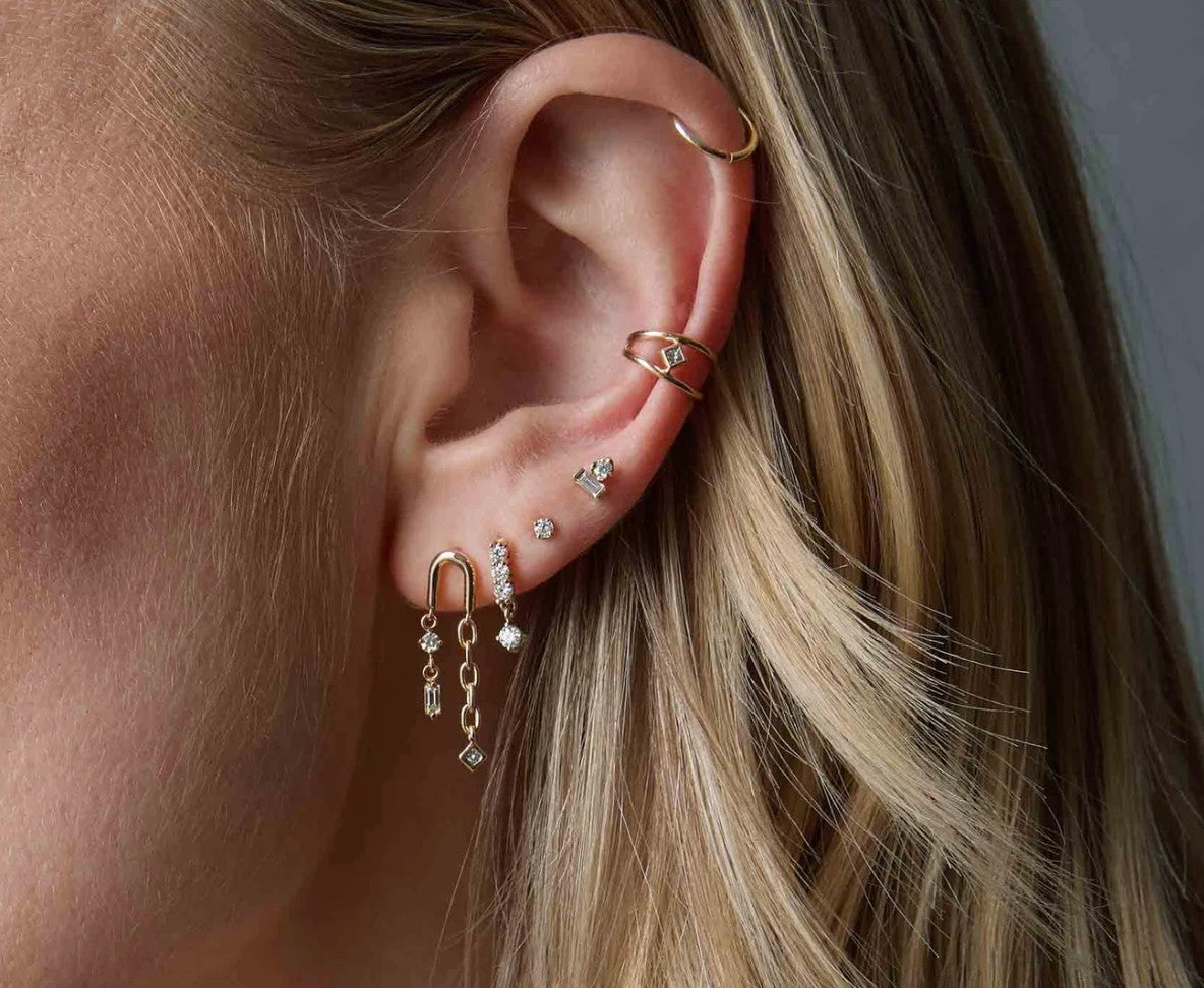 Baguette &amp; Prong Diamond Stacked Studs worn in an ear stack