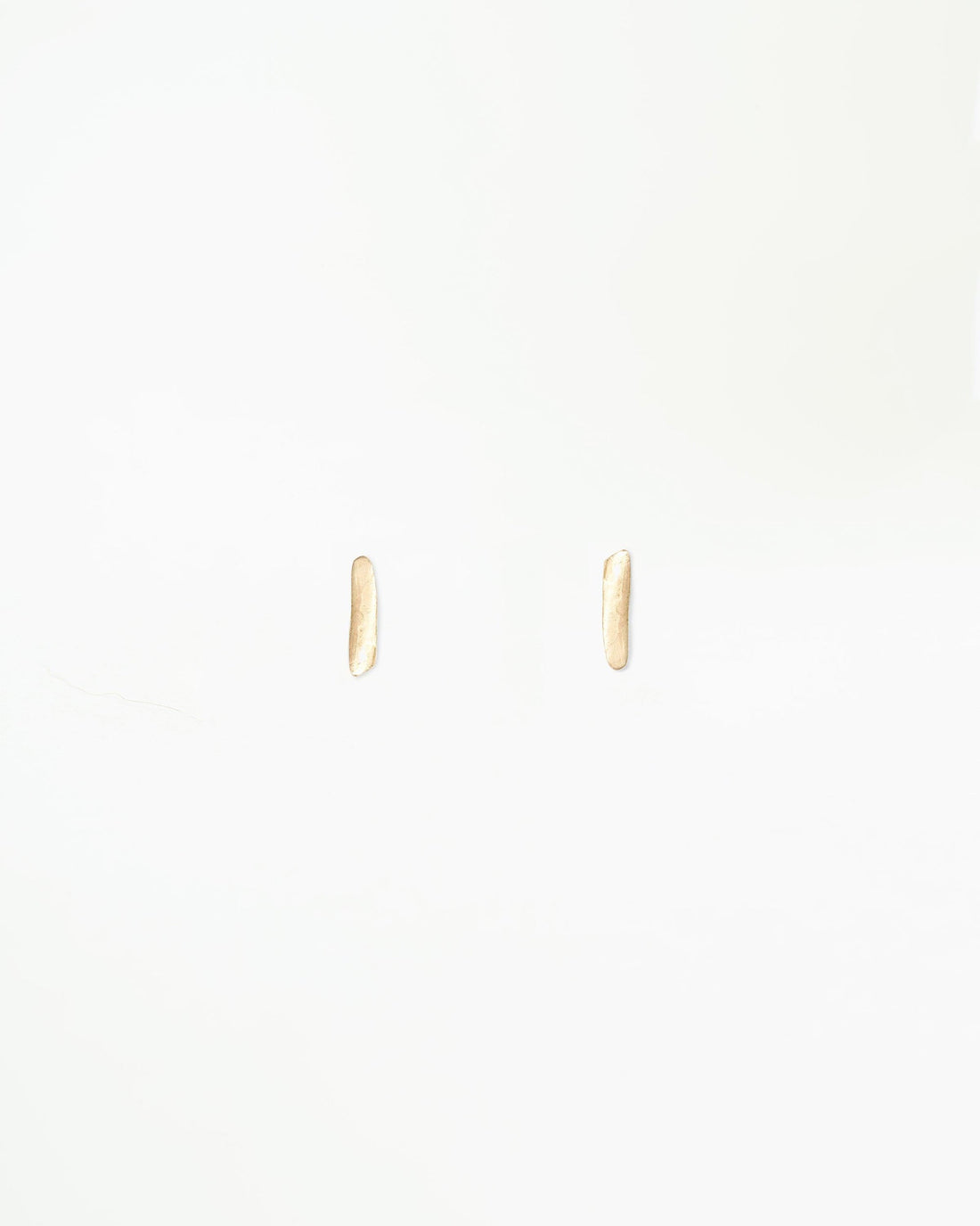 WWAKE Gold Dash Wisp Earrings, tiny 10kt yellow gold bar studs, product view