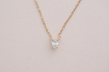 Tear of Cupid Pendant, pear diamond necklace in 14kt yellow gold on blush