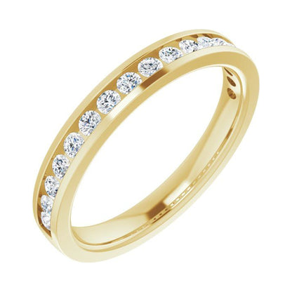 Channel Divina wedding band in 14kt yellow gold with channel set round diamonds, perspective view