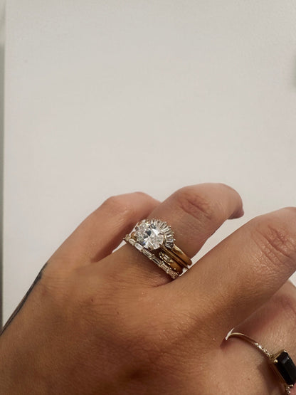 Baguette Potions Wedding Band stacked with a round diamond engagement ring