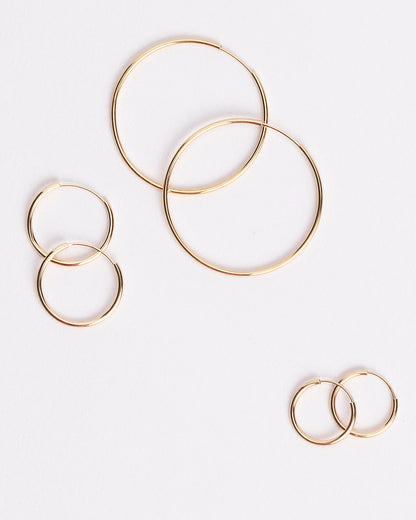 Endless Universe Hoops in 14kt yellow gold