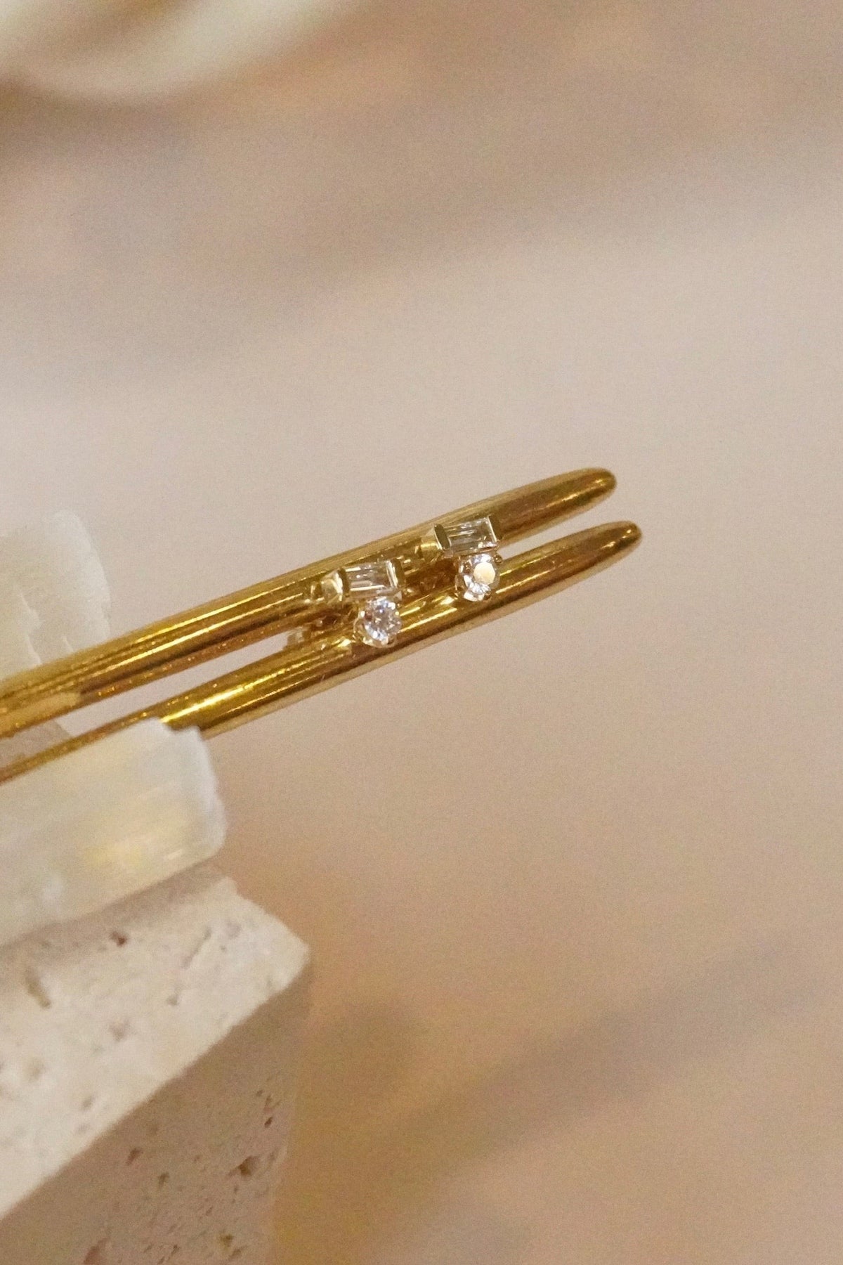 Zoe Chicco Baguette &amp; Prong Diamond Stacked Studs on a gold bangle, detail
