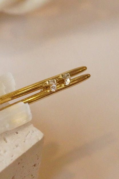 Zoe Chicco Baguette &amp; Prong Diamond Stacked Studs on a gold bangle, detail
