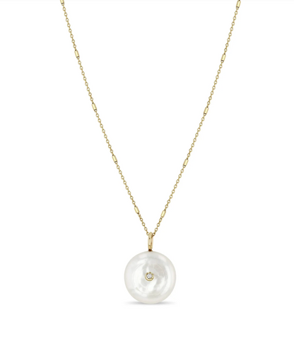 Pearl disc with white diamond side