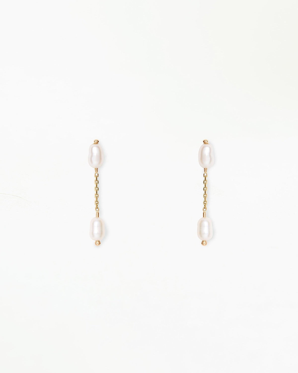 WWAKE Pearl Shower Earrings, two freshwater pearls on a short 14kt yellow gold chain, product view