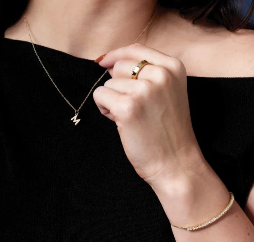 Diamond Initial Necklace worn with a black top