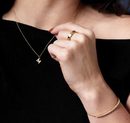Diamond Initial Necklace worn with a black top