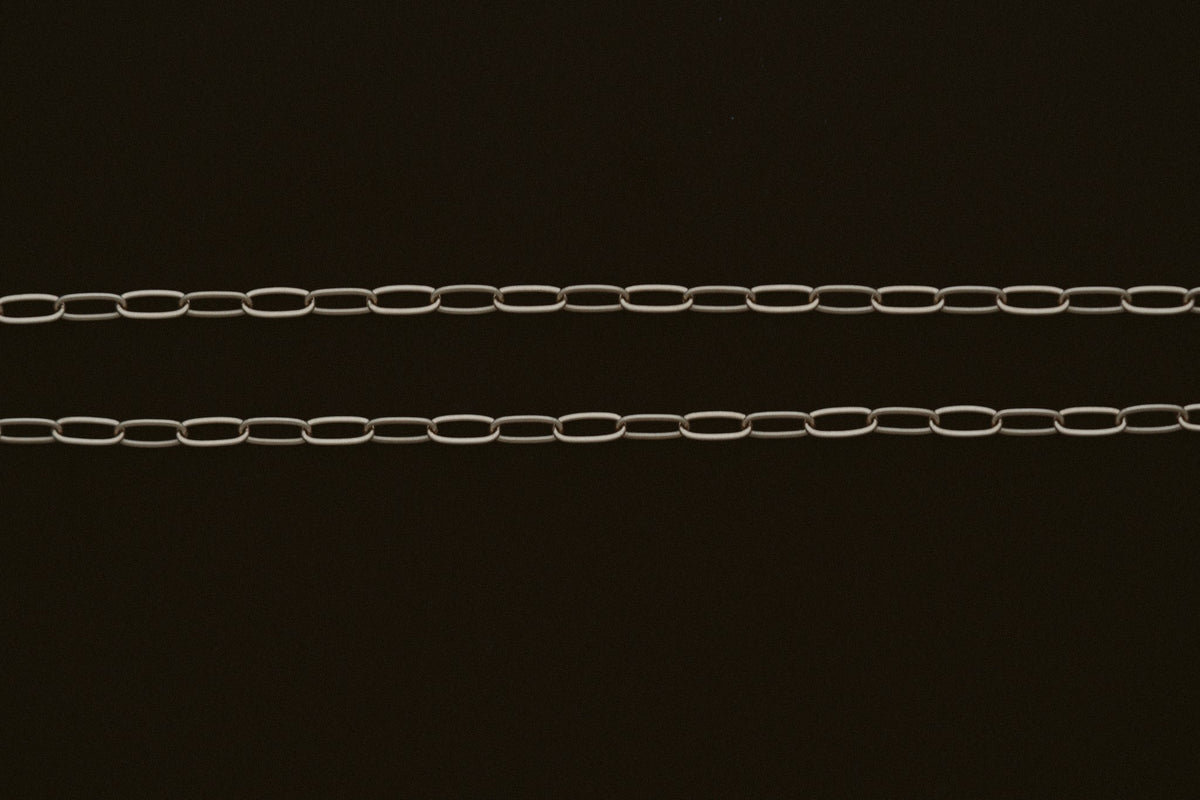 Petite Paperclip Chain Bracelet by Lane &amp; Kate in 14kt yellow gold, laid flat