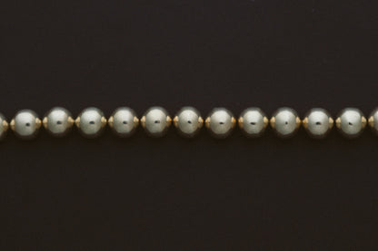 Gold Ball Beaded Chain Bracelet by Zoe Chicco, close up of the polished gold beads