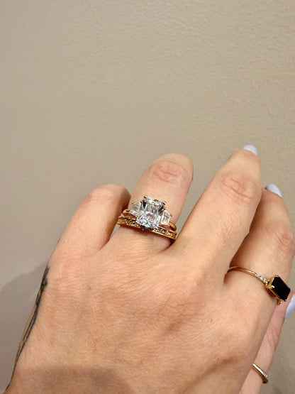 Golden Gardens Band engraved floral band in 14kt yellow gold paired with an engagement ring