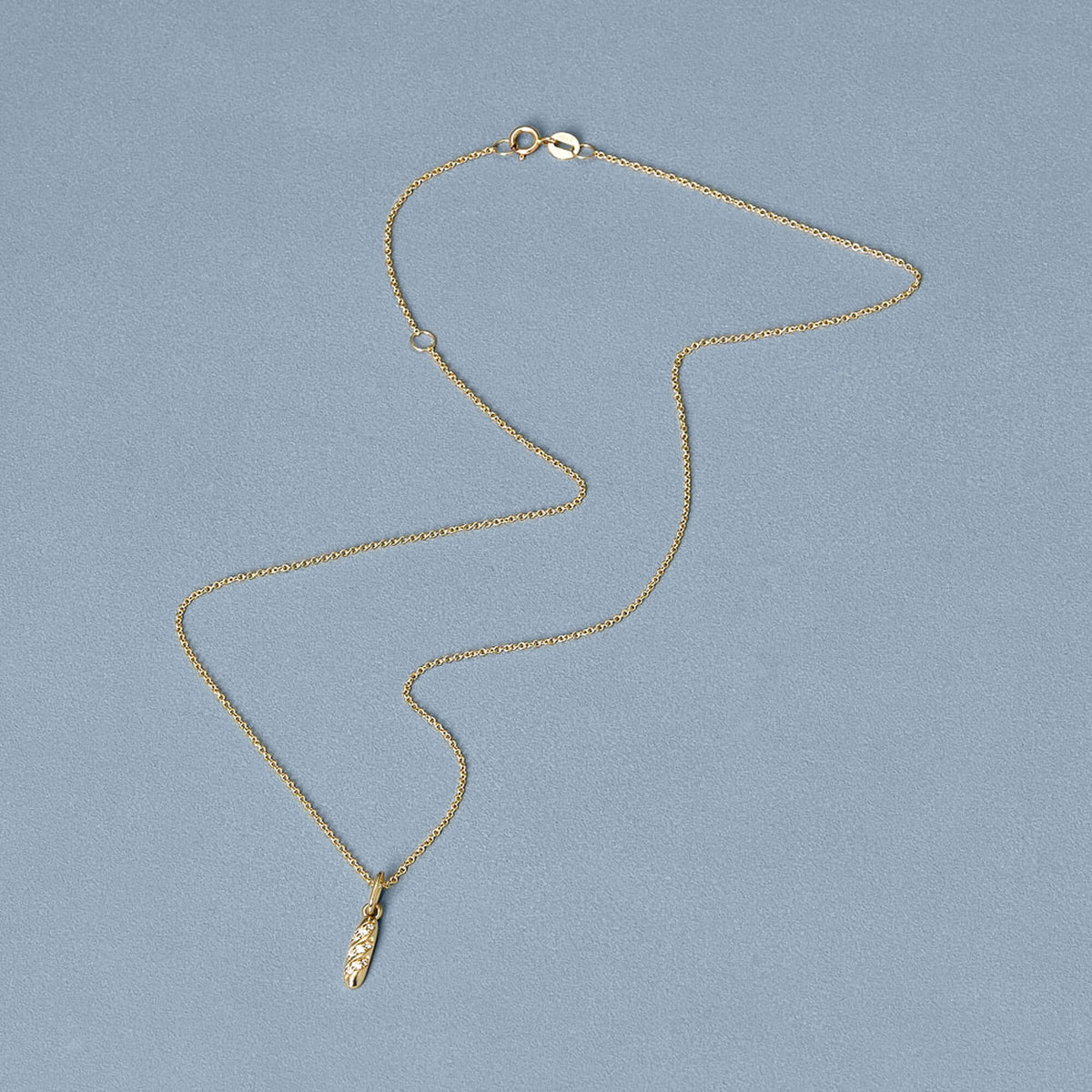 Stone &amp; Strand Diamond Baguette Charm editorial styling