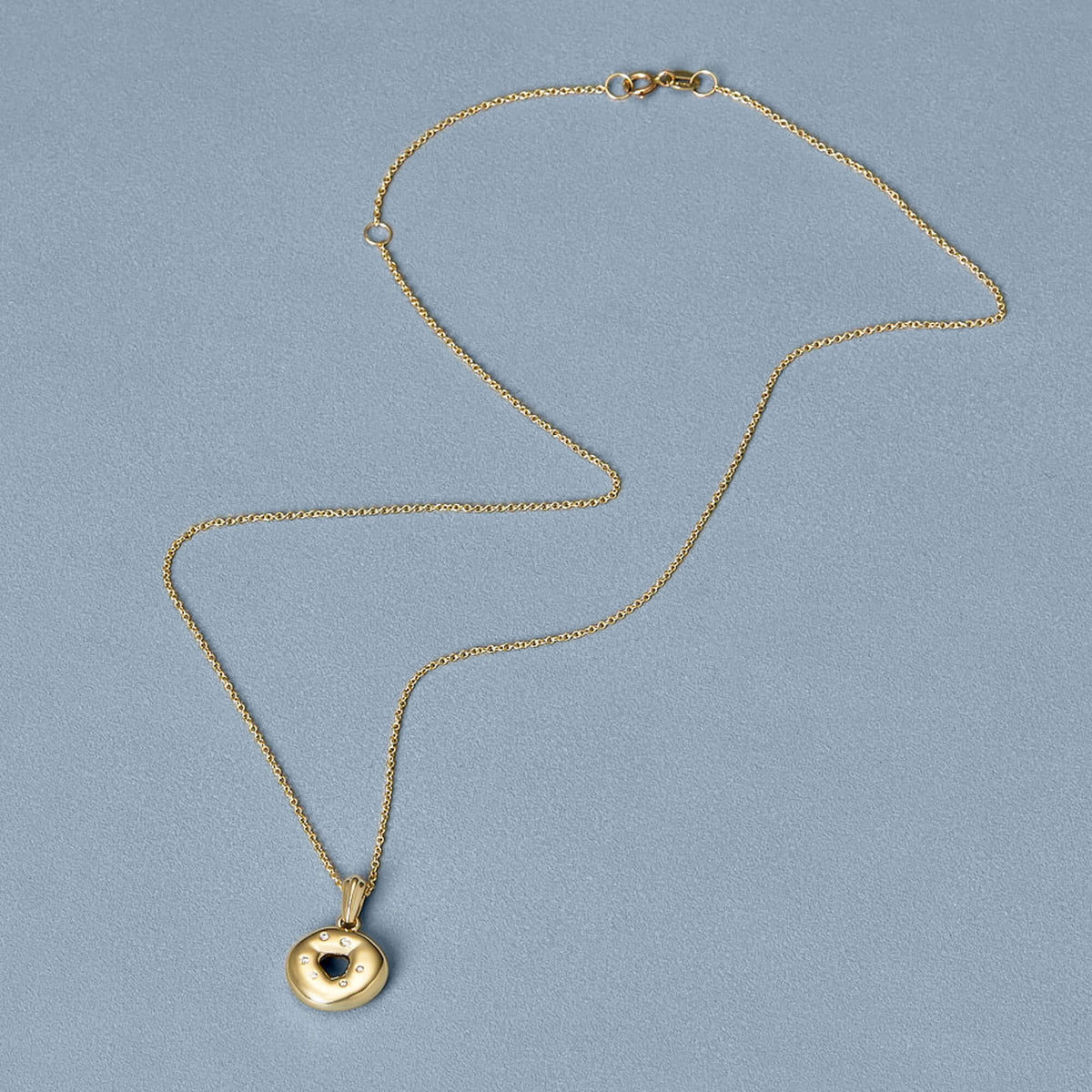 Stone &amp; Strand Gold Bagel Brunch Charm editorial styling
