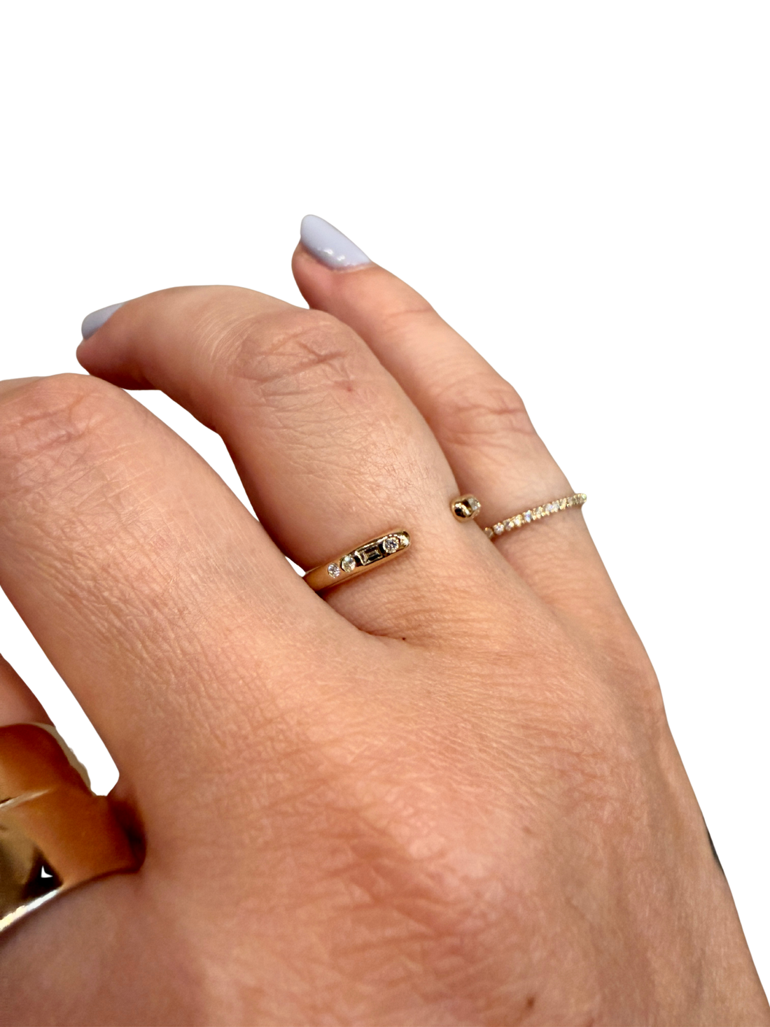 Diamond Staccato Cuff by Jennie Kwon, 14kt gold, three 2 x 1.25mm baguette diamonds, five 1.2mm round white diamonds, open cuff