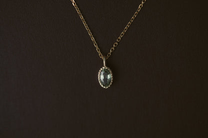 Oval Green Sapphire Wisp Necklace worn