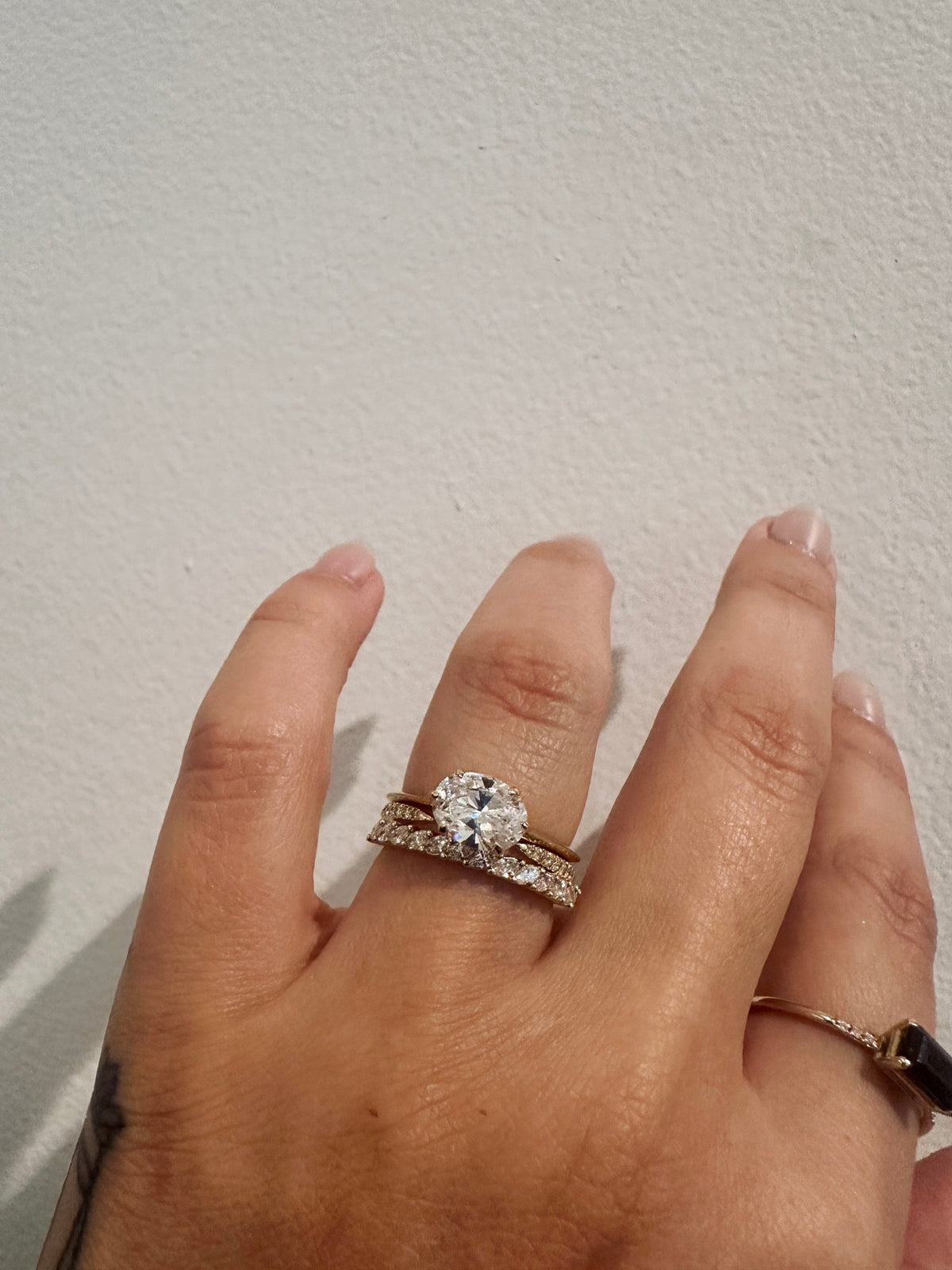 BB Marquise Eros wedding band in 14kt yellow gold with prong set marquise diamonds worn on the hand