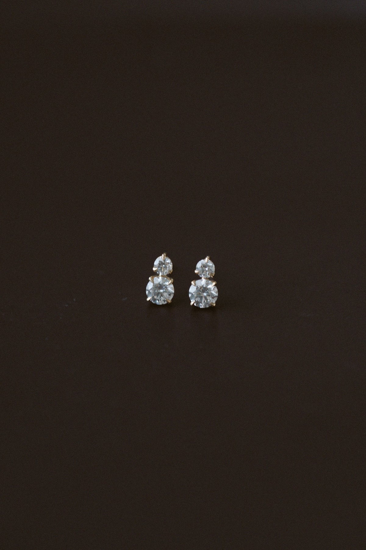 Horizon Diamond Earrings by Lane &amp; Kate, close up of the two stone diamond studs