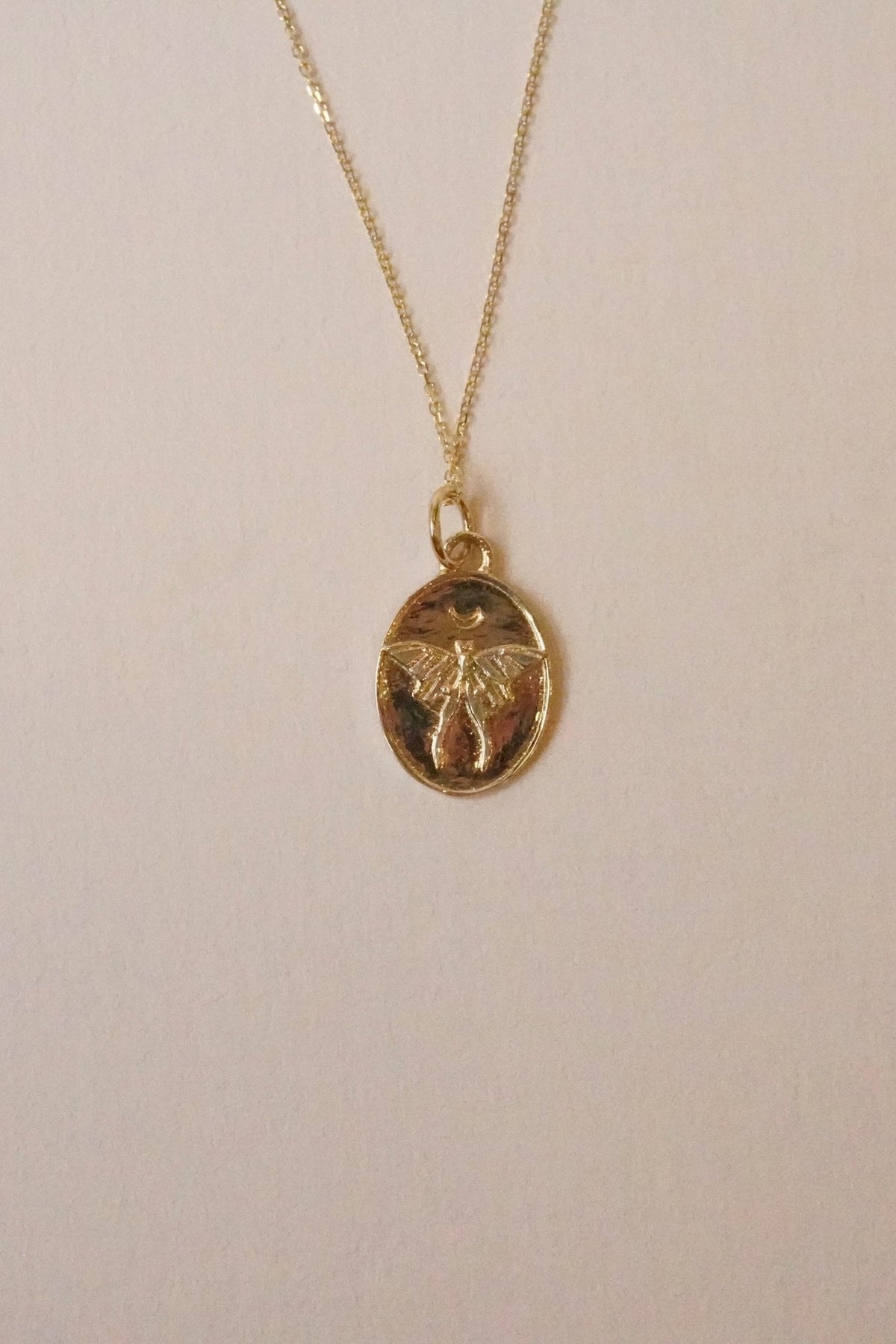 Dusk To Dawn Luna Moth Pendant worn