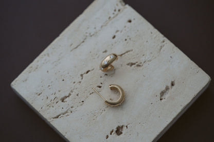 3 Diamond Chubby Huggies by Zoe Chicco, side view of the chubby hoop shape