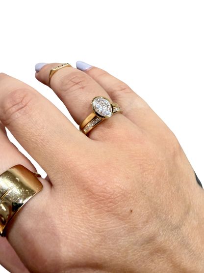Baguette Rivulet Wedding Band by Lane &amp; Kate, worn stacked with an oval engagement ring
