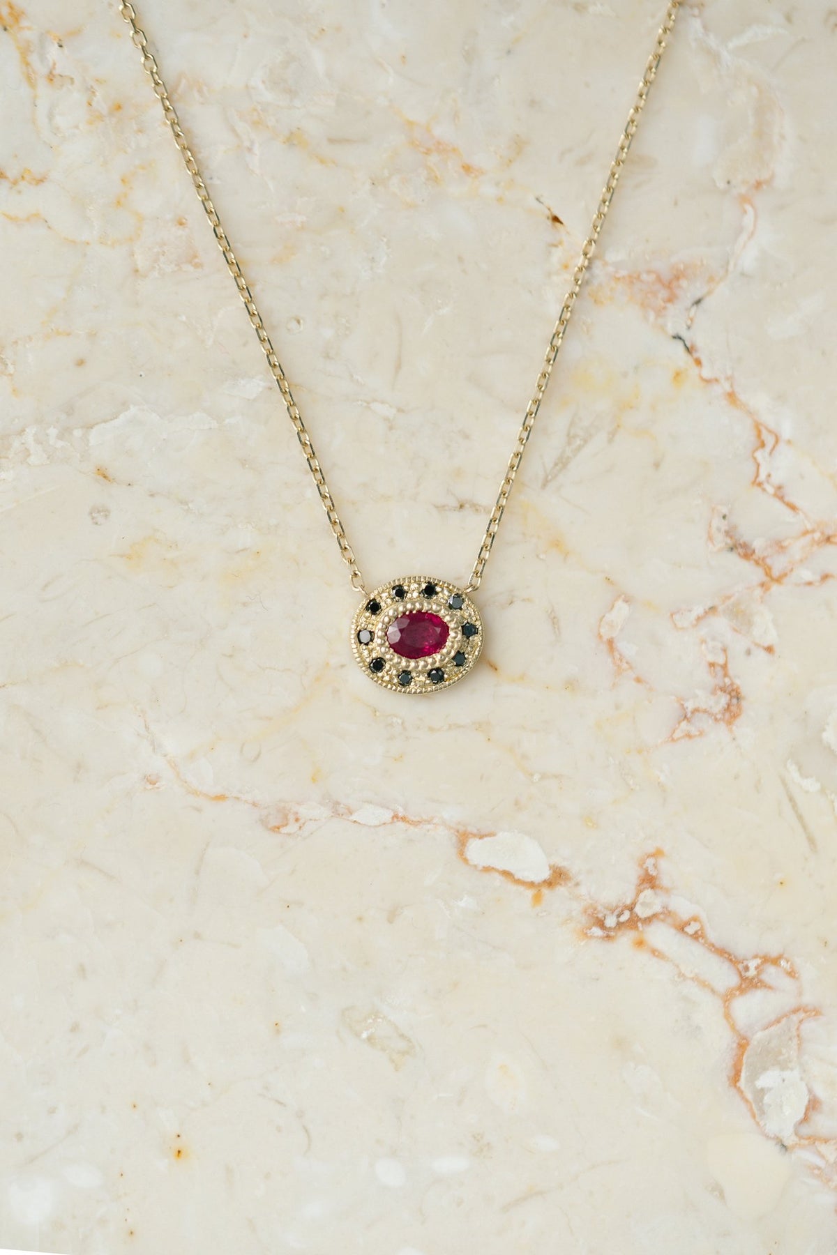 Jennie Kwon Ruby Halo Necklace in 14kt yellow gold