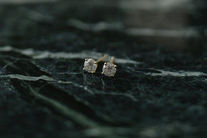 Classic Natural Diamond Earrings by Lane &amp; Kate, round diamond studs in 14kt yellow gold on green marble
