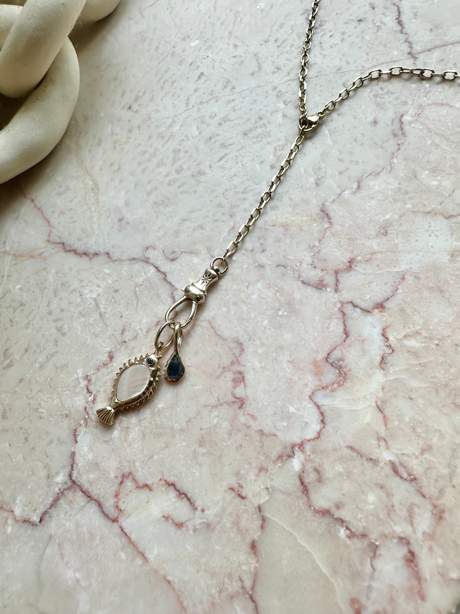 POISSON de LIBERTÉ MOTHER OF PEARL FISH CHARM