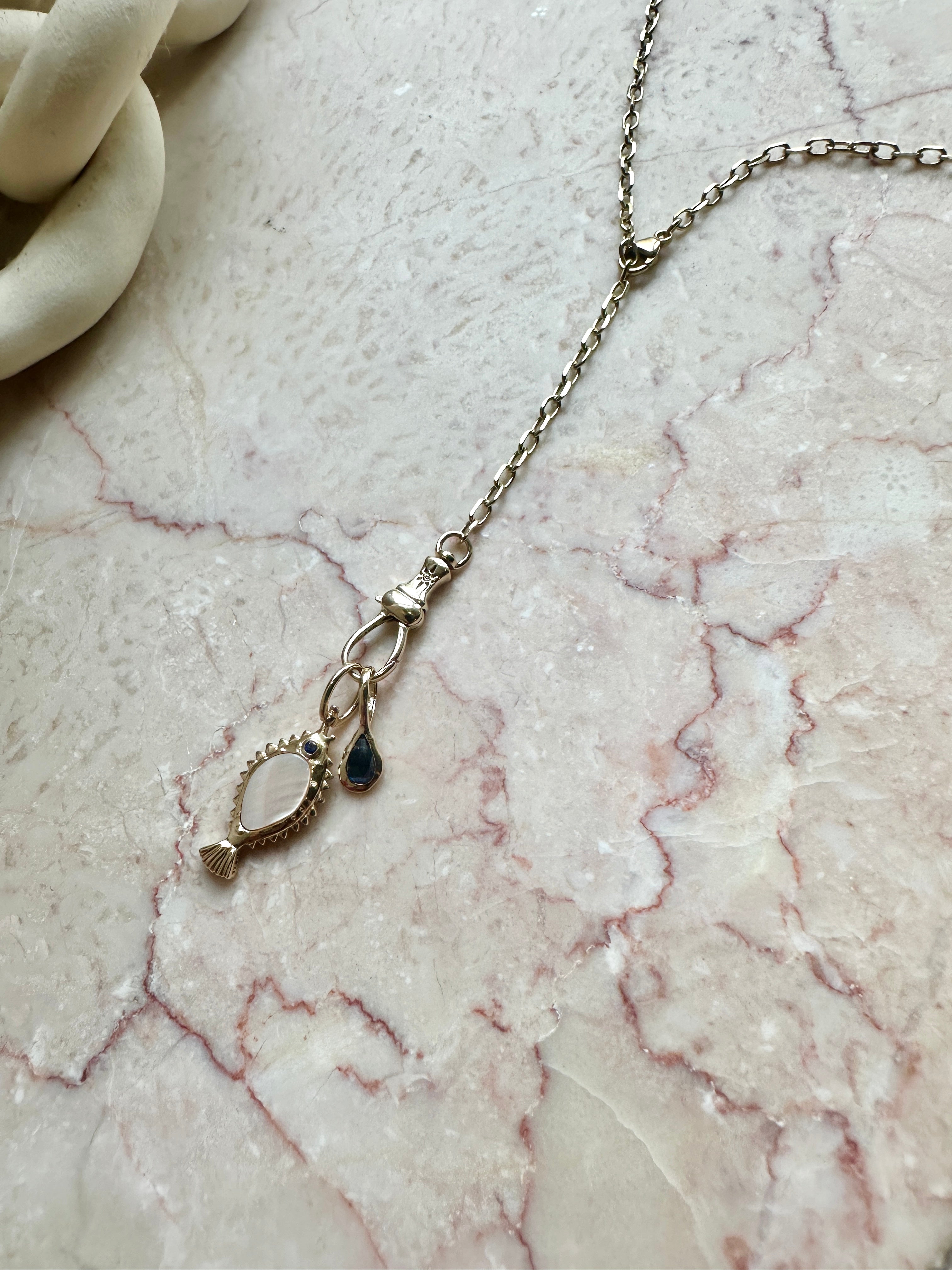 POISSON de LIBERTÉ MOTHER OF PEARL FISH CHARM