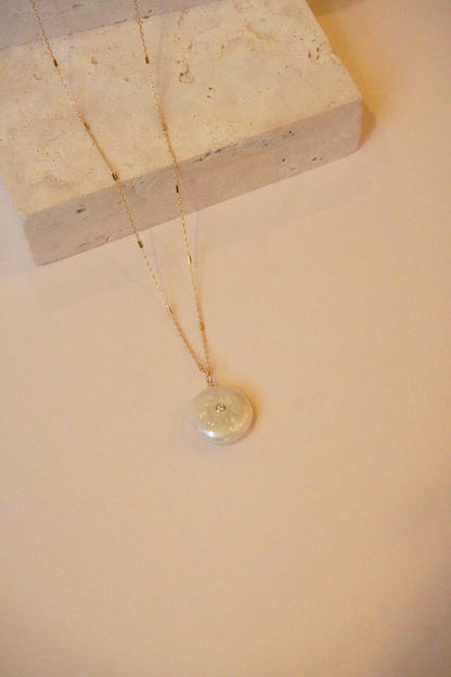 Reversible Black and White Diamond Pearl Disc necklace worn