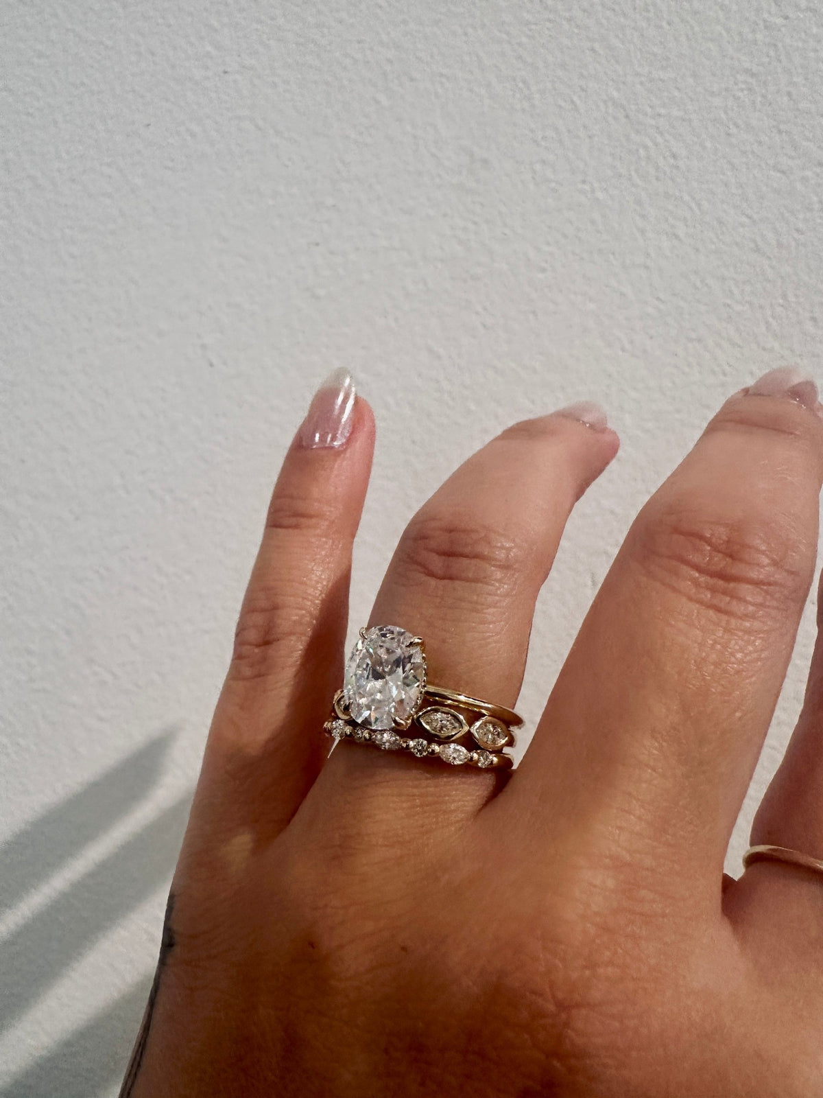 Marquise Diamond Showers wedding band in 14kt yellow gold with marquise and round diamonds worn on the hand