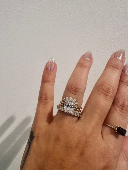 Oval Diamond Devotion Wedding Band stacked with a diamond engagement ring