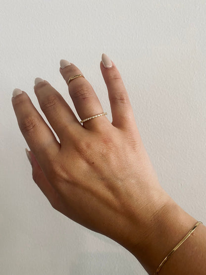 BB Baguette Potions Wedding Band with east to west baguette diamonds worn on hand