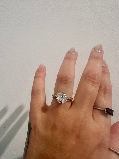 Tapered baguette contour band as a bridal stack on hand