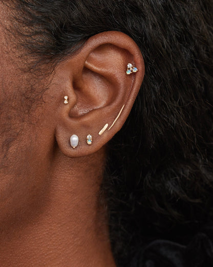 Irregular Pearl Earrings worn in an ear stack